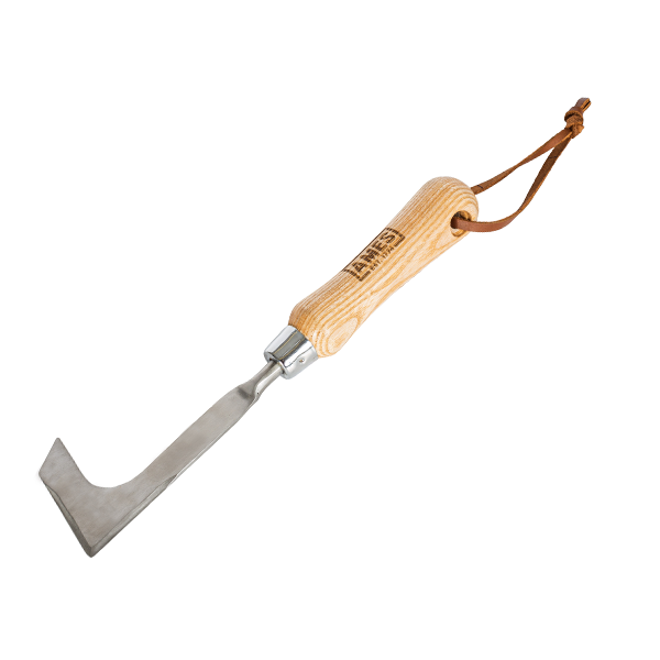 The Hand Patio Weeder - Stainless Steel is a portable tool designed with a wooden handle and a tempered stainless steel blade, making it ideal for removing moss and weeds.