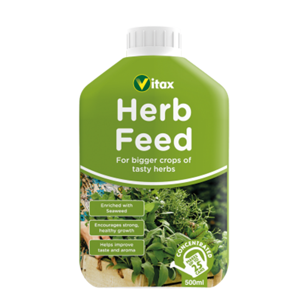 A green bottle of Herb Feed 500ml, claiming to enhance taste and aroma, contains a concentrated formula enriched with seaweed for vegan gardening.