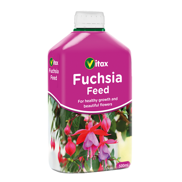 A 500ml bottle of Liquid Fuchsia Feed, adorned with a vibrant pink label showcasing fuchsia flowers, ideal for flowering plants due to its high potash content.