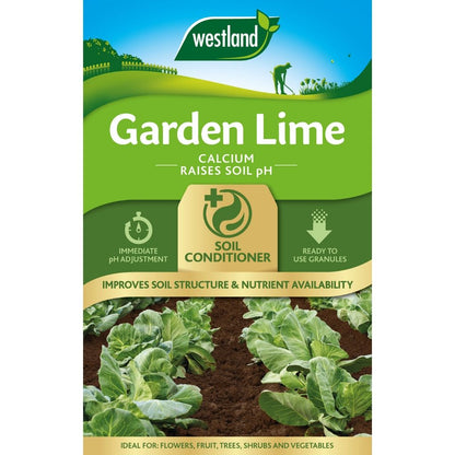 The packaging of Westland Garden Lime 4Kg highlights its capacity to lower soil acidity using calcium for fast pH correction. With convenient ready-to-use granules, it's an ideal soil conditioner. The image shows lush green plants flourishing in nutrient-rich soil.